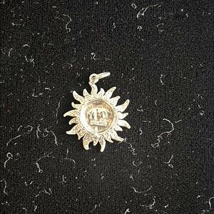 Happy sterling silver sun charm